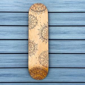 Wood burned mandala skateboard deck